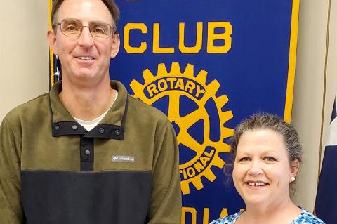 Rotarian Shane Harris and Mollie Swafford, development director of The Bridge