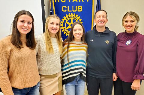 Ella Walser, Arionna Black, Konnar McClendon, Coach Aaron Marks, and Rotarian Sarah Rader