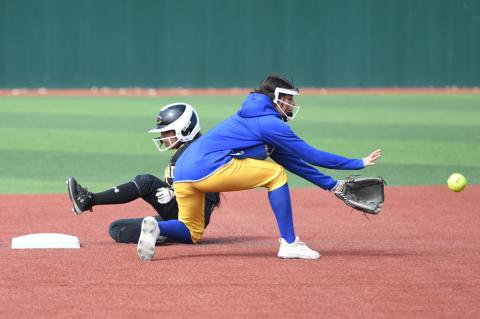 Jaime Salazar slides into second base