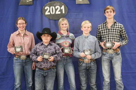 Grand Champion winners: Macie Hansen, goat; Easton Schafer, swine; Kinley Long, heifer; Ryan Leach, lamb; Teagan Ash, steer