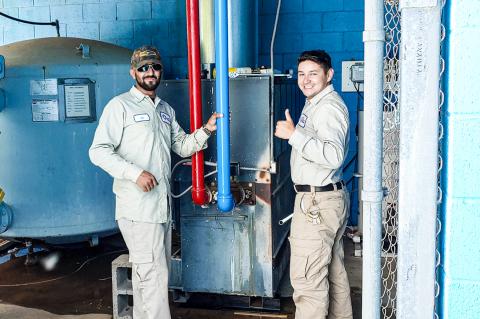 City Department employees Ed Manriquez and Trey Evans