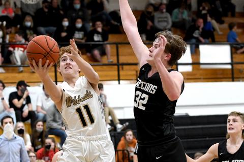 Camren Cavalier goes in for the layup