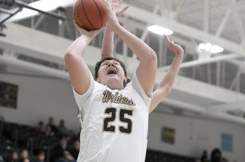 Kaden Carr (25) in the paint for 2