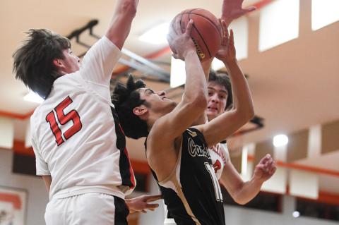 Jaxtyn Valenzuela (10) draws a foul from Shallowater on a short jumper