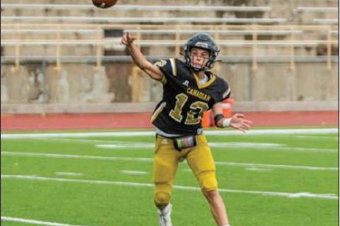JV quarterback Trace Mitchell (12) releases a pass against Fritch