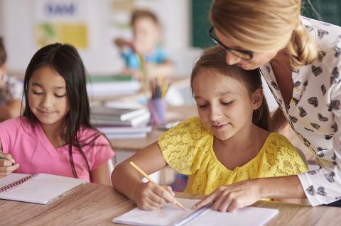 Teacher with students