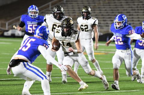 Josh Culwell (14) isn't afraid to mix it up with a quarterback-keeper