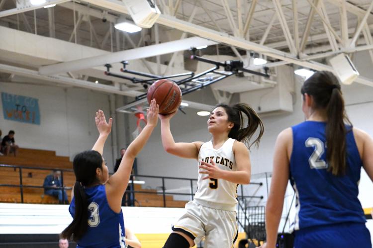Lady Cat #5 Jasmyn Moreno catches some air for a layup in Canadian’s loss to Childress on December 10.
