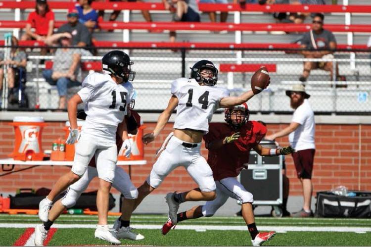JOSH CULWELL (NO. 14) MAKES A ONE-HANDED, FINGERTIP INTERCEPTION IN SATURDAY’S SCRIMMAGE AT BORGER