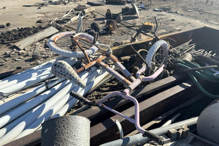 A child's bicycle salvaged from a burned home