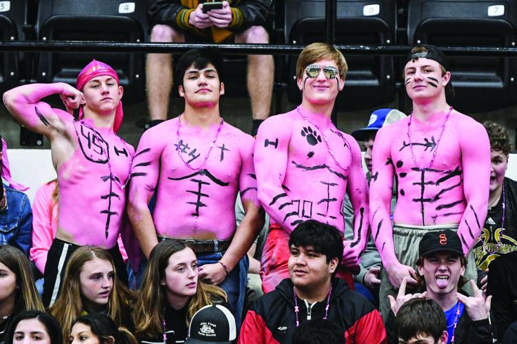 Landon Smith, Jorge Dominguez, Colton Cooper, and Hayze Hufstedler go all out in pink out for Lawana Pulliam.