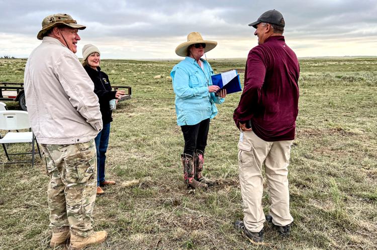 Beth Ramp Sturgeon confers with archaeological enthusiasts, whose artifact discoveries have helped fill gaps in the map of the military trail.