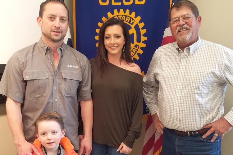Eric and Lacey Macias with son, Mack, and Rotarian Steve Rader