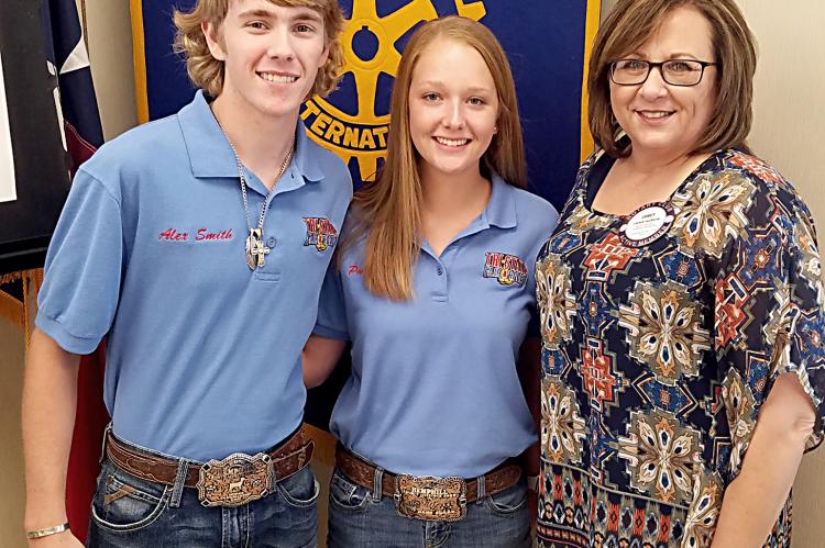 ROTARIAN JANET GUTHRIE WITH 4-H LEADERS, ALEX SMITH AND PAIGE PERRY