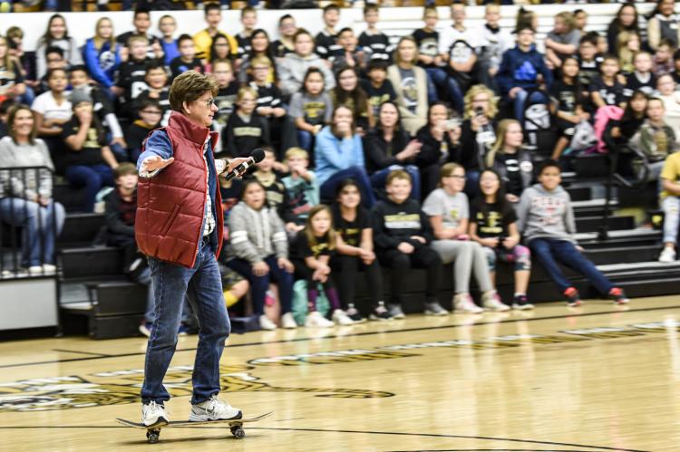 Larry Smith as Marty McFly skateboarded into the gym to introduce the show.