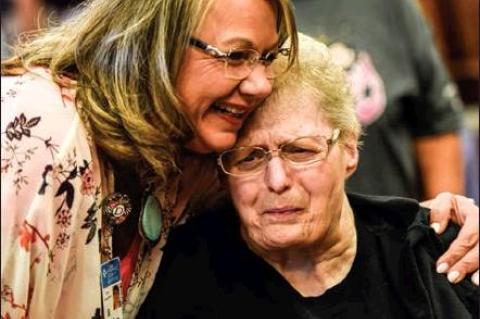 Hemphill County Hospital’s Chief Clinical Officer Debra Sappenfield shares an emotional moment with Edward Abraham Memorial Home(EAMH) resident Carolyn Tucker during the reception prior to Wednesday’s groundbreaking ceremony.