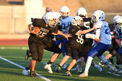 Wildcat 7th-grader Sharlene Cervantes (15) makes it into the end zone for Cats' final TD of the season