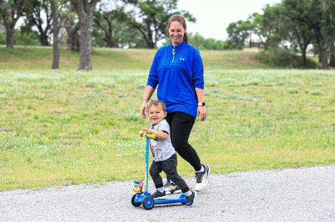 This year's youngest CCC Bike-A-Thon participant was the charming Doc Longoria (shown above with mom, Megan) who scootered 6.2 miles!