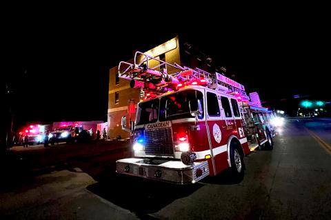 The three-story Moody Building, which houses the Cattle Exchange and Abraham Trading, was one of the best selling points for County Commissioners to buy this 75-foot aerial ladder firetruck back in 2009. The greatest fear early Monday morning when the sirens sounded was that it just might be needed this time.