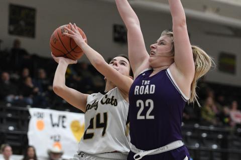 Ella Walser (24) draws a foul from the River Road defender
