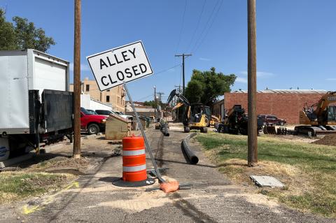 Amarillo Utility Contractors stage in the alley between Main & Purcell Friday afternoon for final phase of the project
