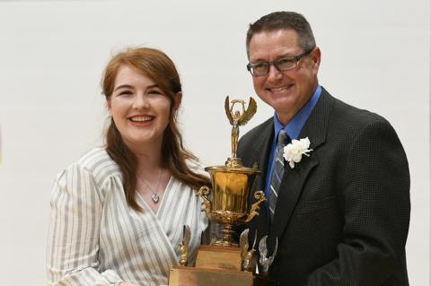 Maggie Hanes accepts Abraham Cup from Dr. Lynn Pulliam
