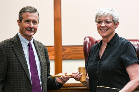 Judge George Briant turns the gavel over to his successor, Lisa Johnson