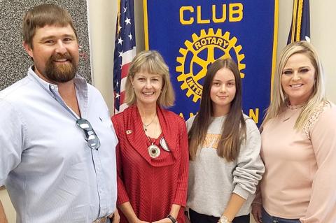 David Witcher, Rotarian Beth Briant, Cody Johnson, and Dusty Witcher