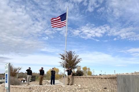 In the flagpole photo: Warren Rivers, Mark Heusel, Matthew Huff, and Bradley Baker