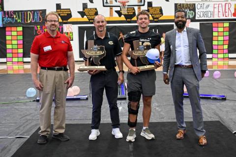 Canadian High School junior quarterback Weston Mitchell was presented with the 2026 Week 1 Class 3A Built Ford Tough Texas High School Football Player of the Week award during Friday’s pep rally. Pictured from left are Parkway Ford Service Director Mike Lane, Canadian High School Head Coach Andy Cavalier, Weston Mitchell, and Parkway Ford General Manager Desmond Stirgus. 